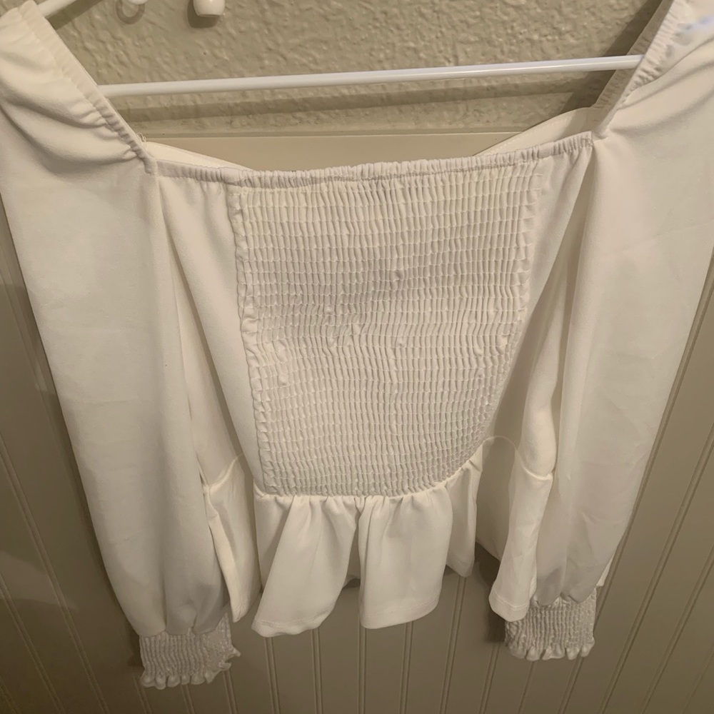 WHITE PEPLUM TOP - Picture 2 of 4